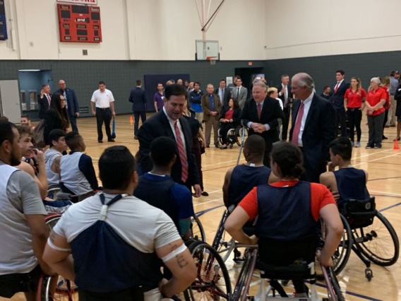 Governor Ducey and President Robbins speak with students during a visit to the DRC's Adaptive Athletics Program Ribbon Cutting Ceremony