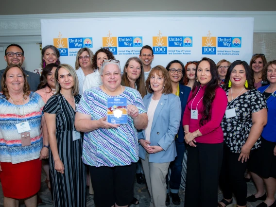 UA Cares Ambassadors and campus supporters pose for a photo with the Cornerstone Award at the Circle of Excellence Awards hosted by the United Way of Tucson and Southern Arizona.