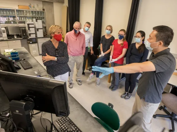 Biomedical engineering professor Jeong-Yeol Yoon and his team show President Robert C. Robbins and Provost Liesl Folks around the Biosensors Lab.