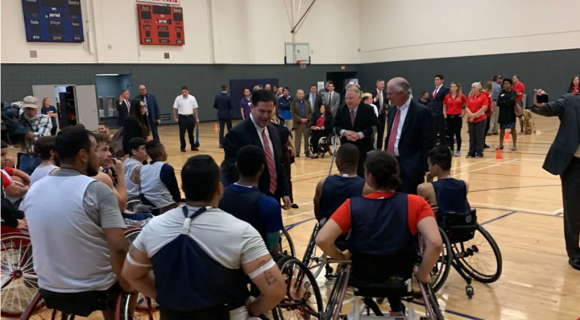 Governor Ducey and President Robbins speak with students during a visit to the DRC's Adaptive Athletics Program Ribbon Cutting Ceremony