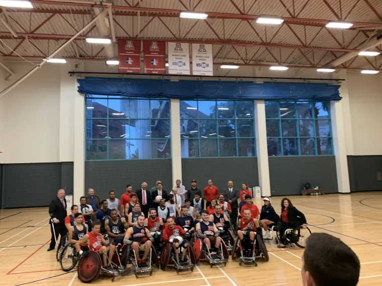 The UA Adaptive Athletics team takes a group photo