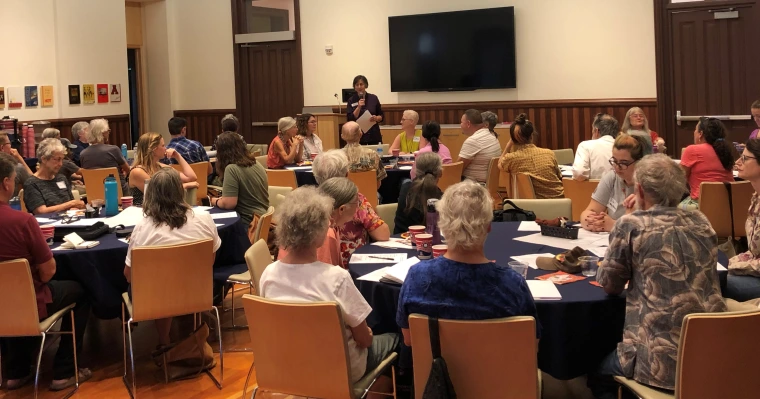 Representatives from communities around the university campus attend a moderated forum in Old Main